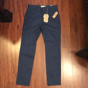 Dark blue pants.